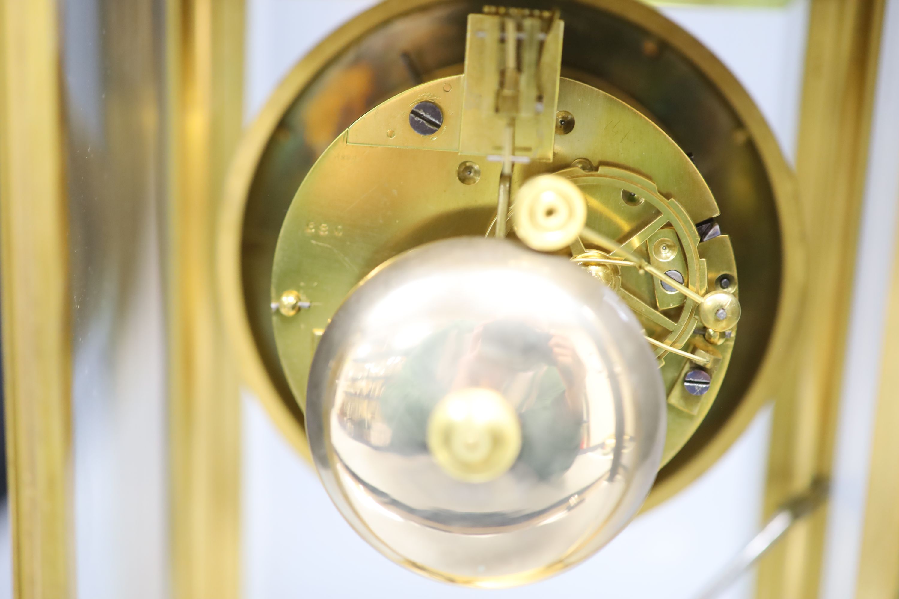 A 19th century French four-glass mantel clock, bell-striking movement with countwheel, mercury pendulum, with key, 30cm high